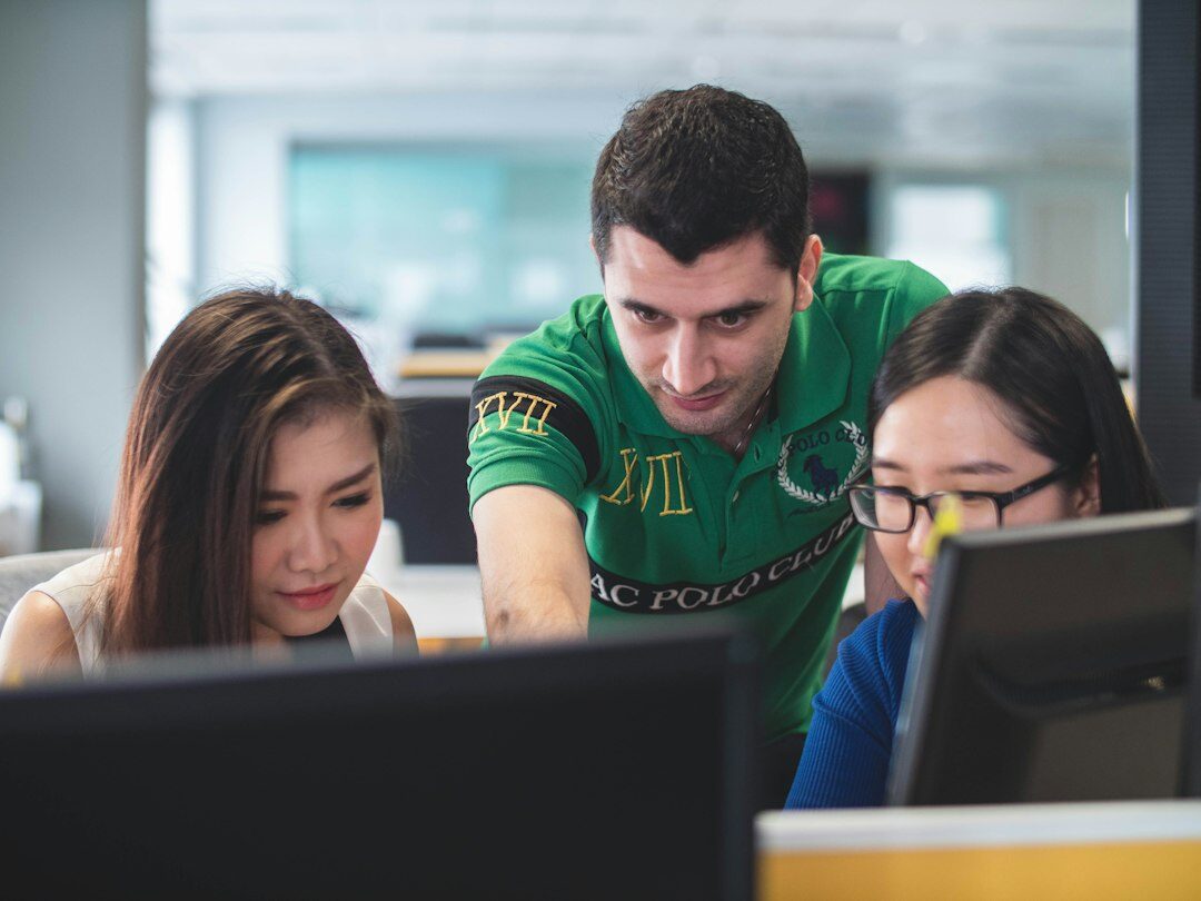 group of students coding together