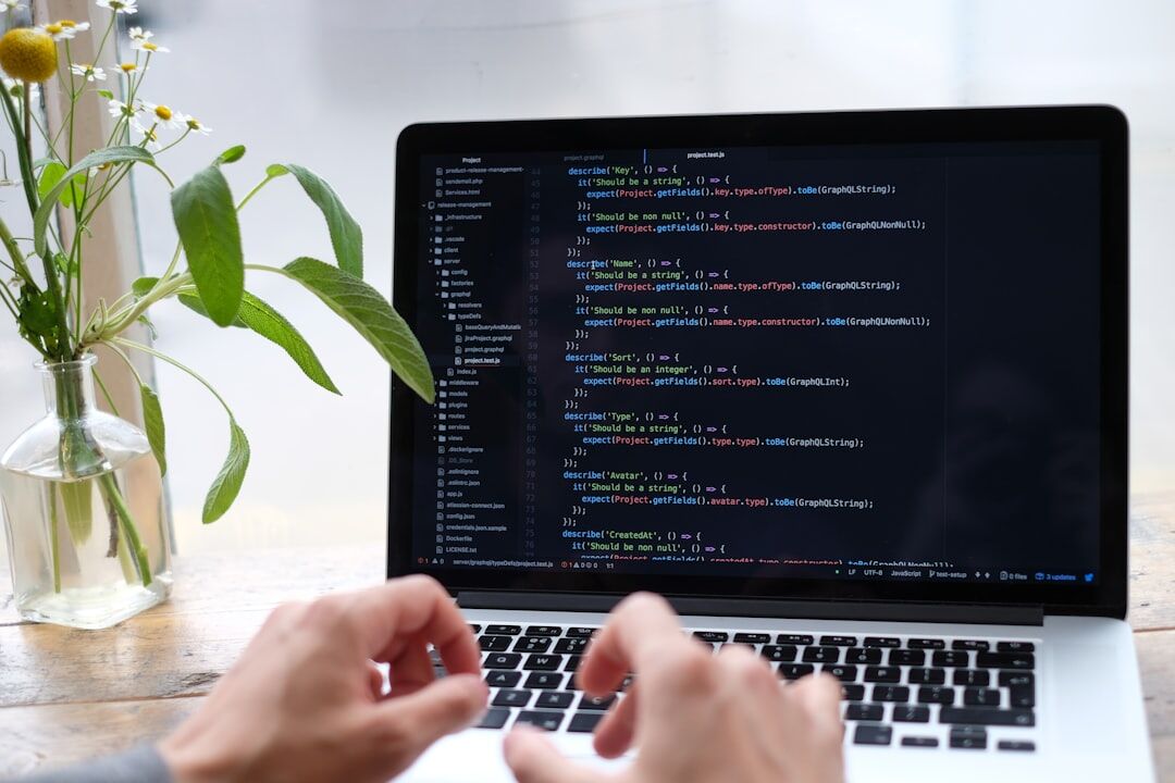 person learning to code on laptop